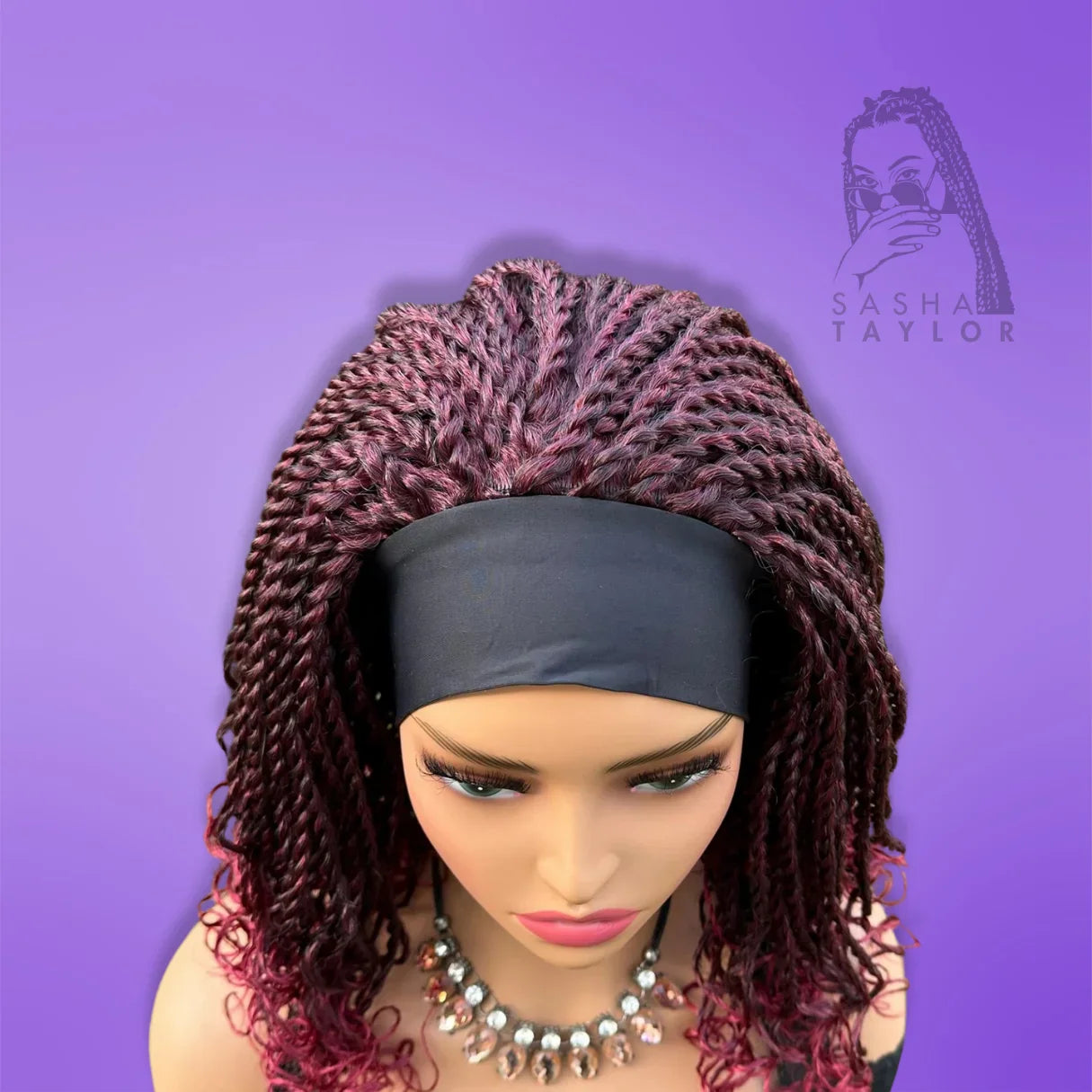 a red short synthetic handband braided wig on a model