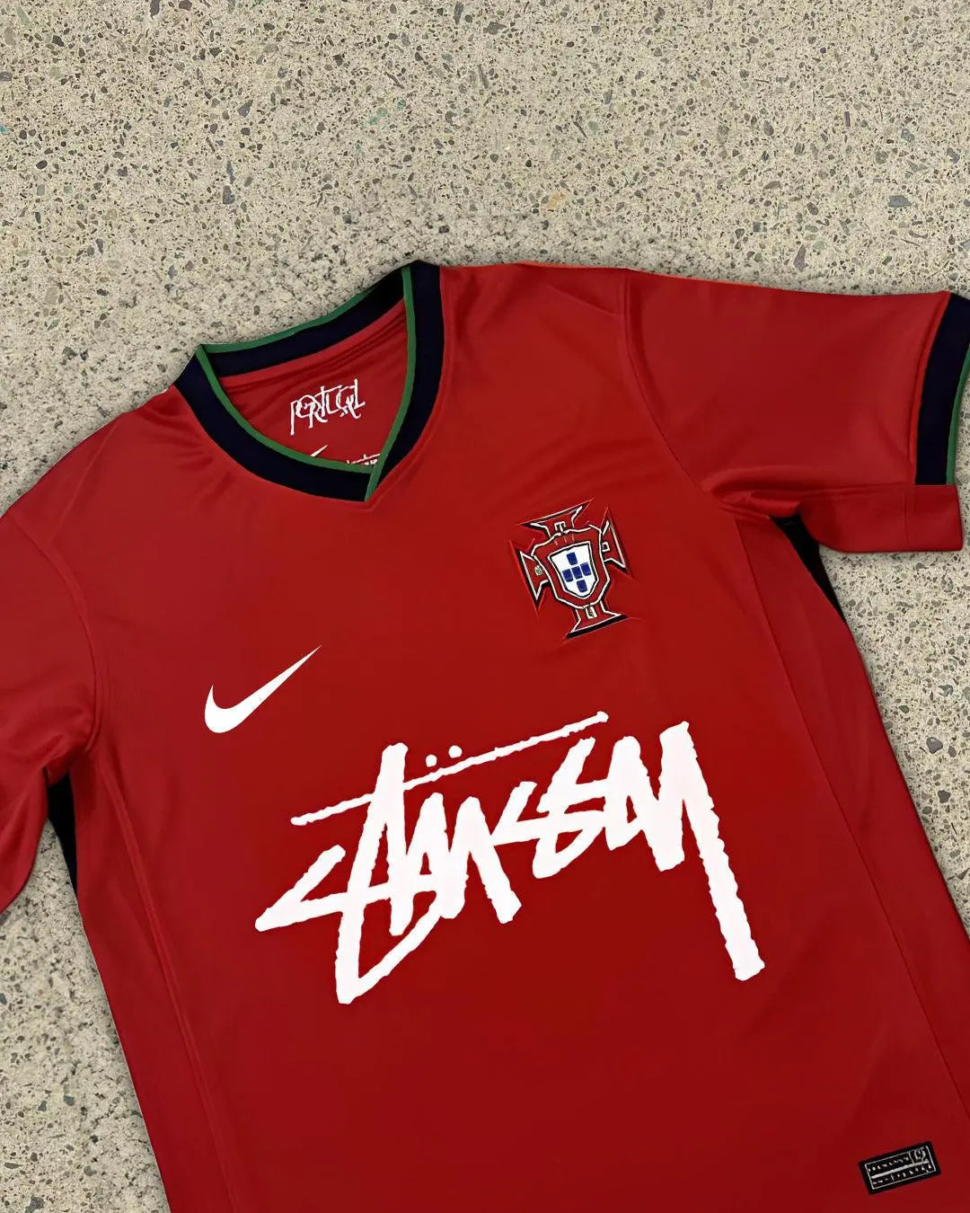 stussy soccer jersey Portugal Edition Jersey featuring vibrant red and green colors, stussy soccer jersey branding, and the Portugal national crest, celebrating the fusion of streetwear and football.